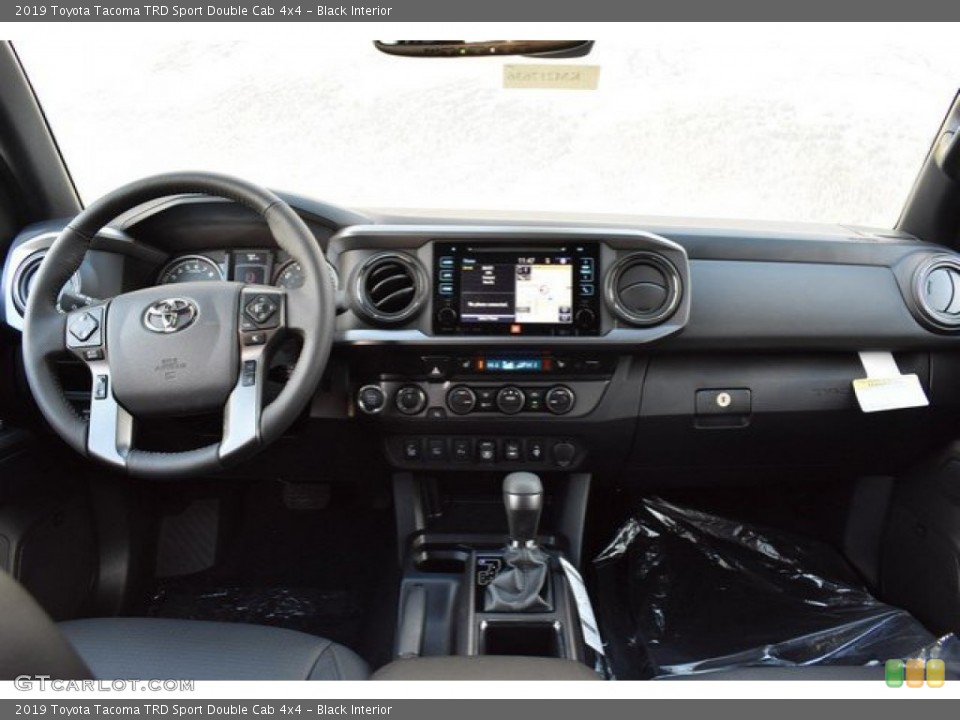 Black Interior Dashboard for the 2019 Toyota Tacoma TRD Sport Double Cab 4x4 #131442385