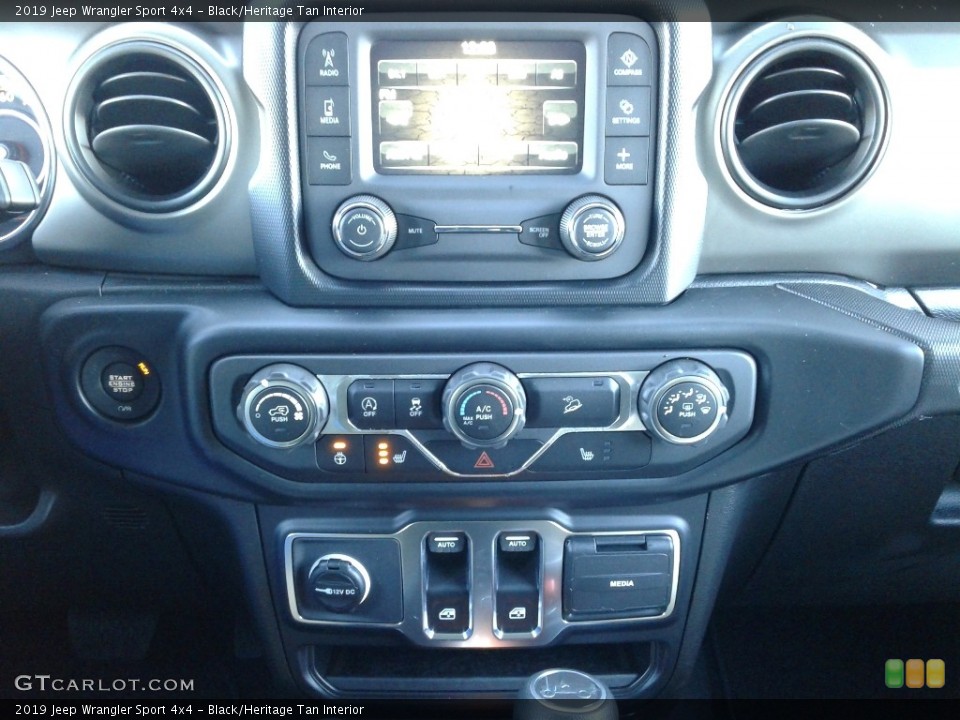 Black/Heritage Tan Interior Controls for the 2019 Jeep Wrangler Sport 4x4 #131633986