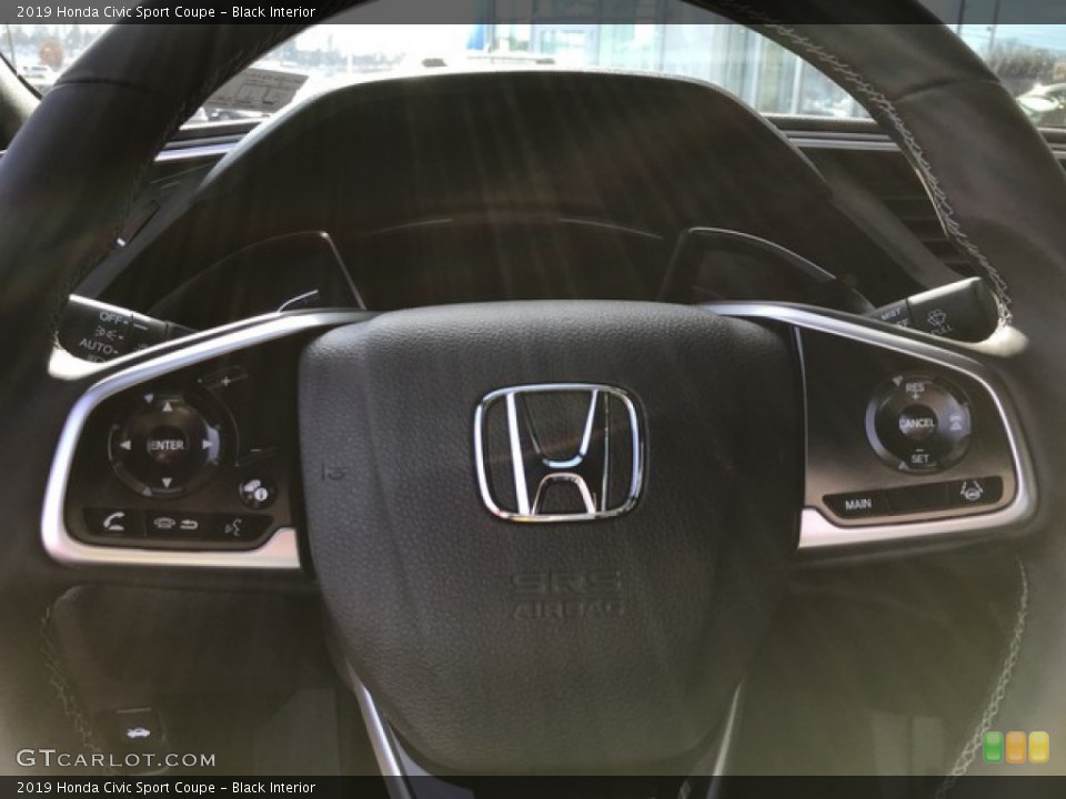 Black Interior Steering Wheel for the 2019 Honda Civic Sport Coupe #131646592