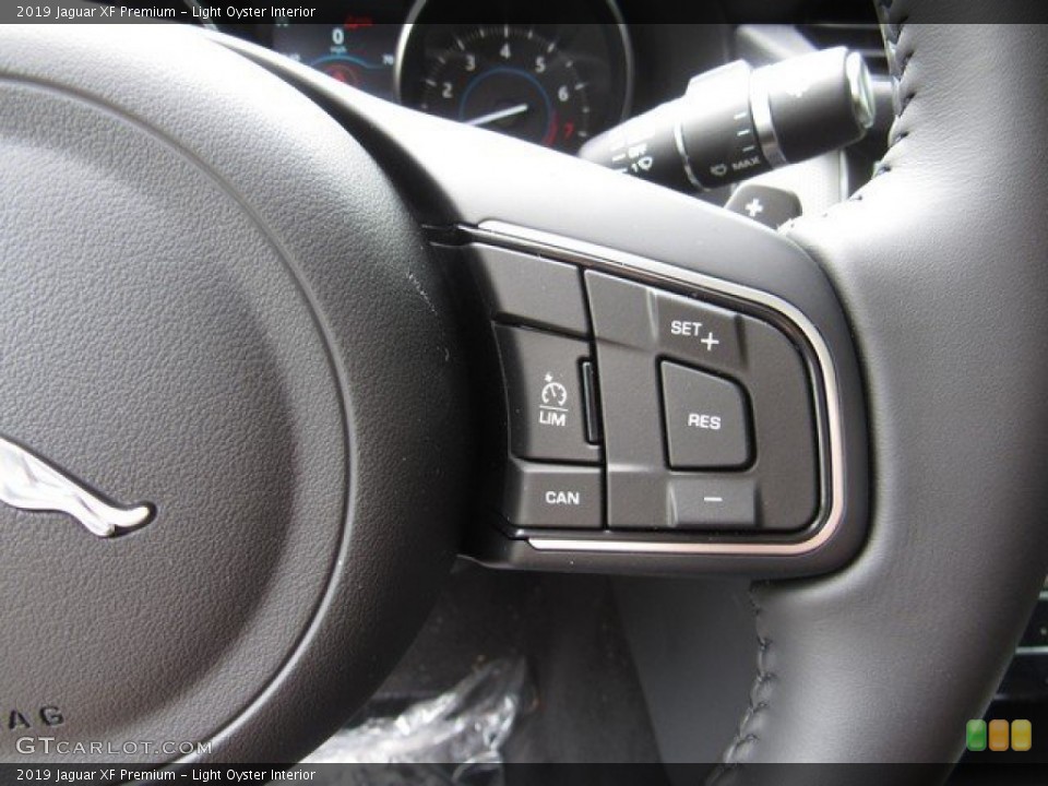 Light Oyster Interior Steering Wheel for the 2019 Jaguar XF Premium #132802139