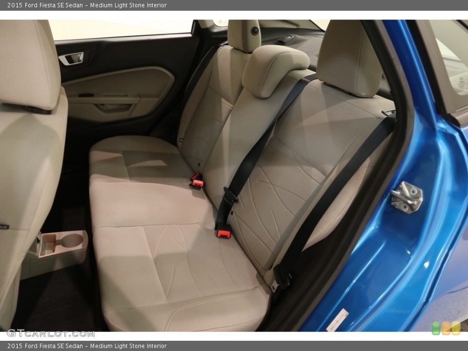 Medium Light Stone Interior Rear Seat for the 2015 Ford Fiesta SE Sedan #133119194