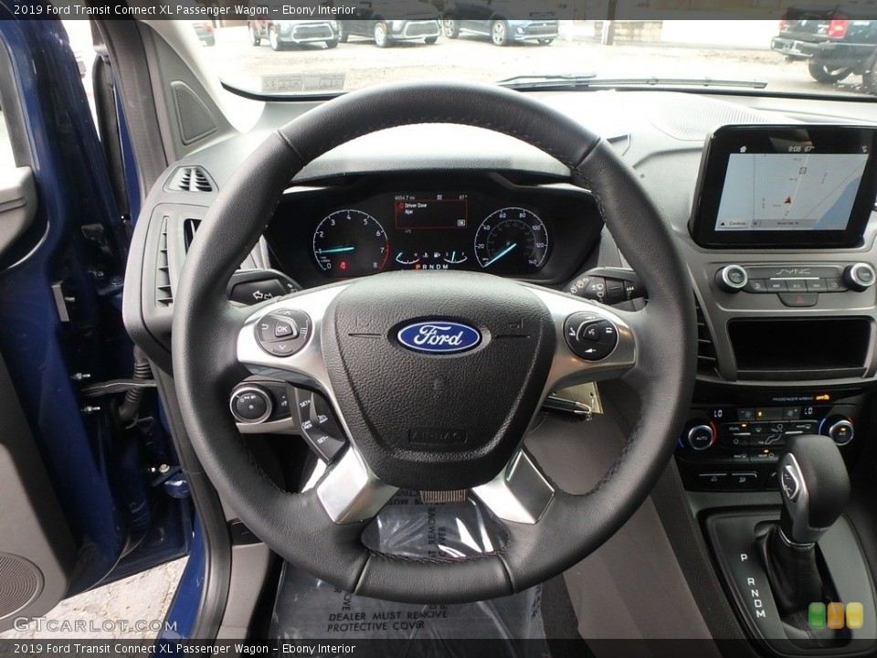 Ebony Interior Steering Wheel for the 2019 Ford Transit Connect XL Passenger Wagon #133196368