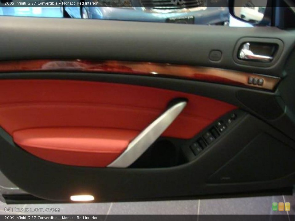Monaco Red Interior Door Panel for the 2009 Infiniti G 37 Convertible #13332920