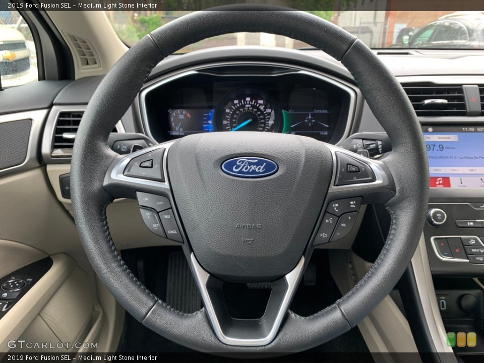 Medium Light Stone Interior Steering Wheel for the 2019 Ford Fusion SEL #133333571