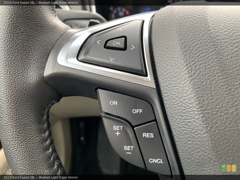 Medium Light Stone Interior Steering Wheel for the 2019 Ford Fusion SEL #133333626