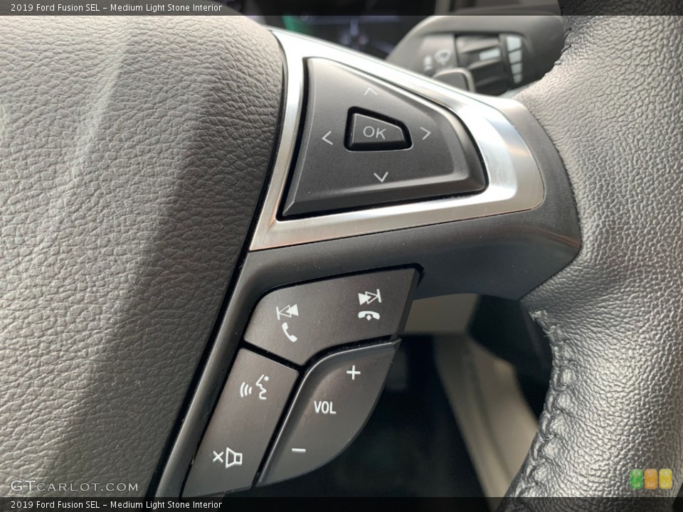 Medium Light Stone Interior Steering Wheel for the 2019 Ford Fusion SEL #133333655