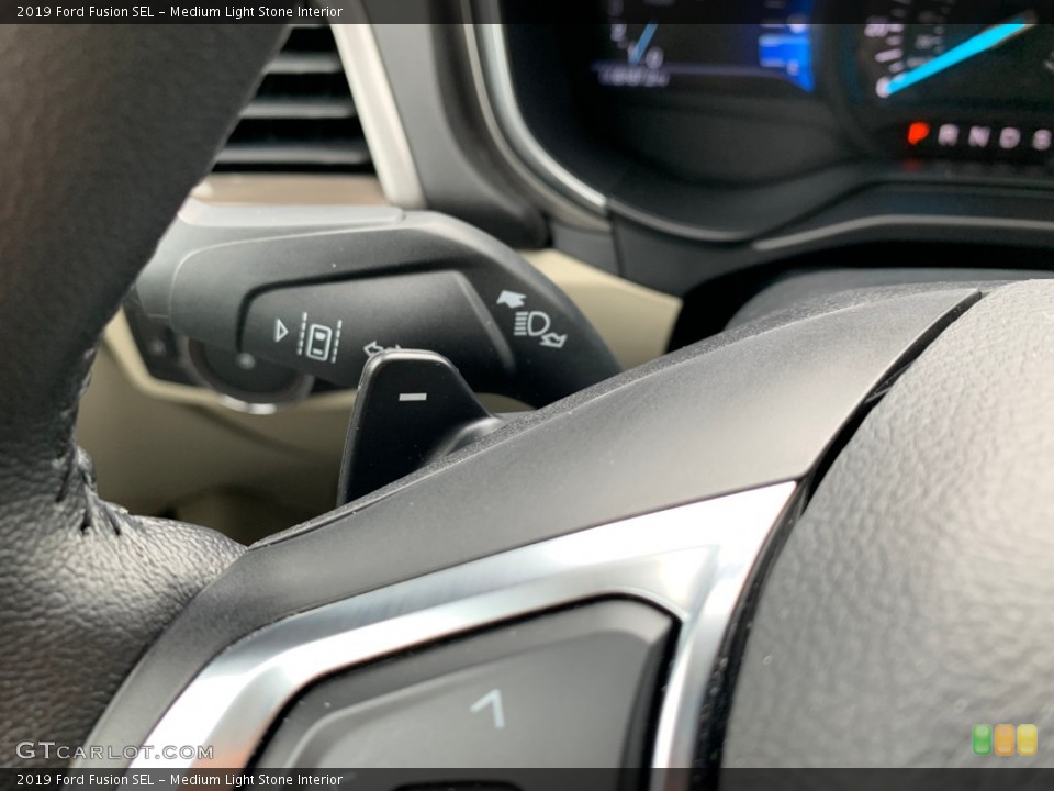 Medium Light Stone Interior Controls for the 2019 Ford Fusion SEL #133333679