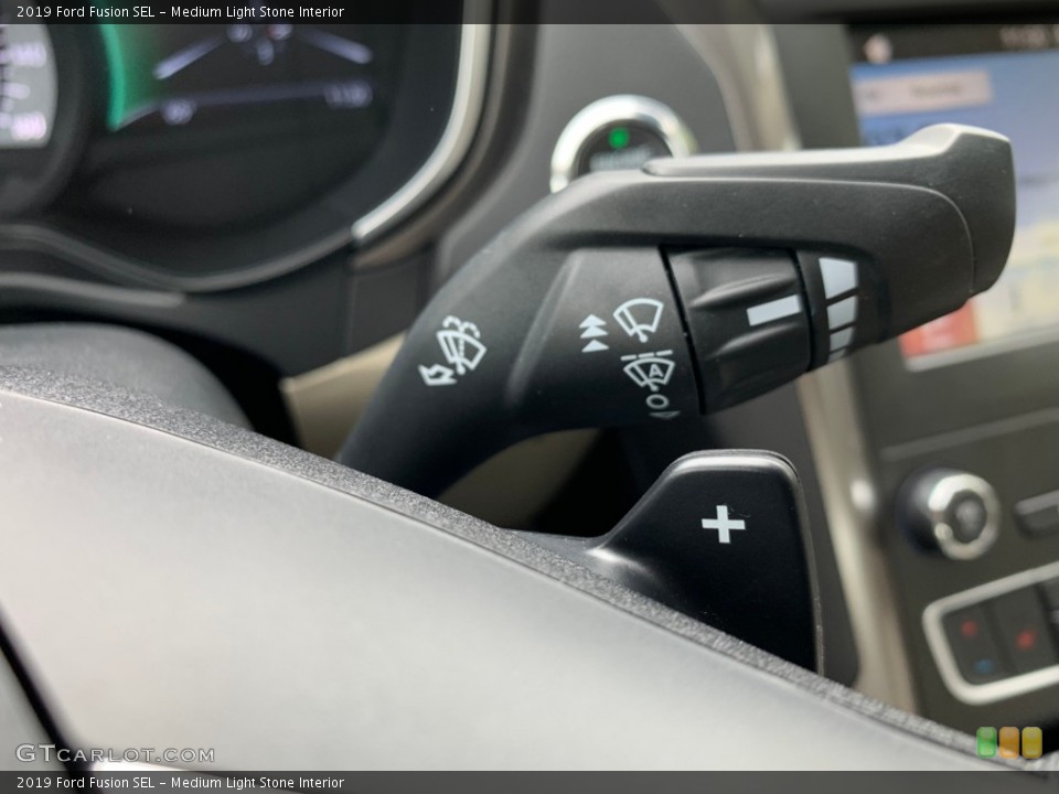Medium Light Stone Interior Controls for the 2019 Ford Fusion SEL #133333697