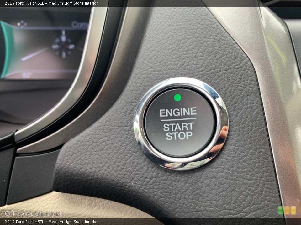 Medium Light Stone Interior Controls for the 2019 Ford Fusion SEL #133333721