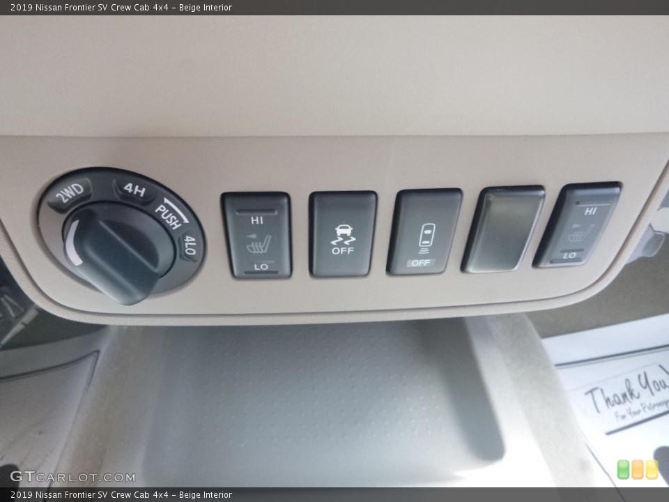 Beige Interior Controls for the 2019 Nissan Frontier SV Crew Cab 4x4 #133466884
