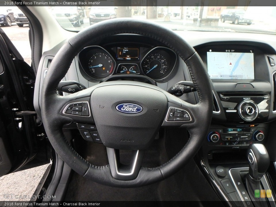 Charcoal Black Interior Steering Wheel for the 2018 Ford Focus Titanium Hatch #133564966