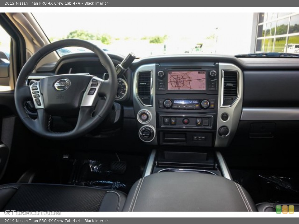 Black Interior Dashboard for the 2019 Nissan Titan PRO 4X Crew Cab 4x4 #134016416