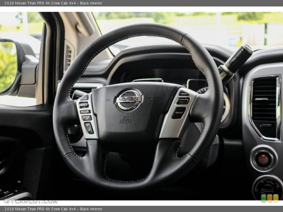 Black Interior Steering Wheel for the 2019 Nissan Titan PRO 4X Crew Cab 4x4 #134016465