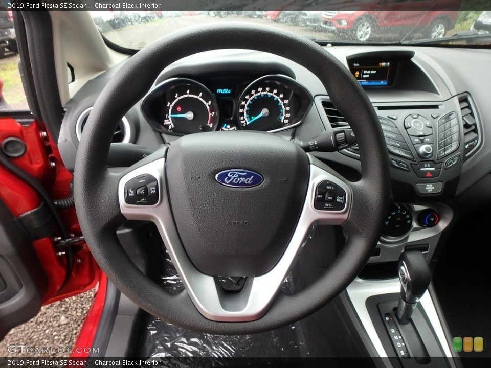 Charcoal Black Interior Steering Wheel for the 2019 Ford Fiesta SE Sedan #134716310