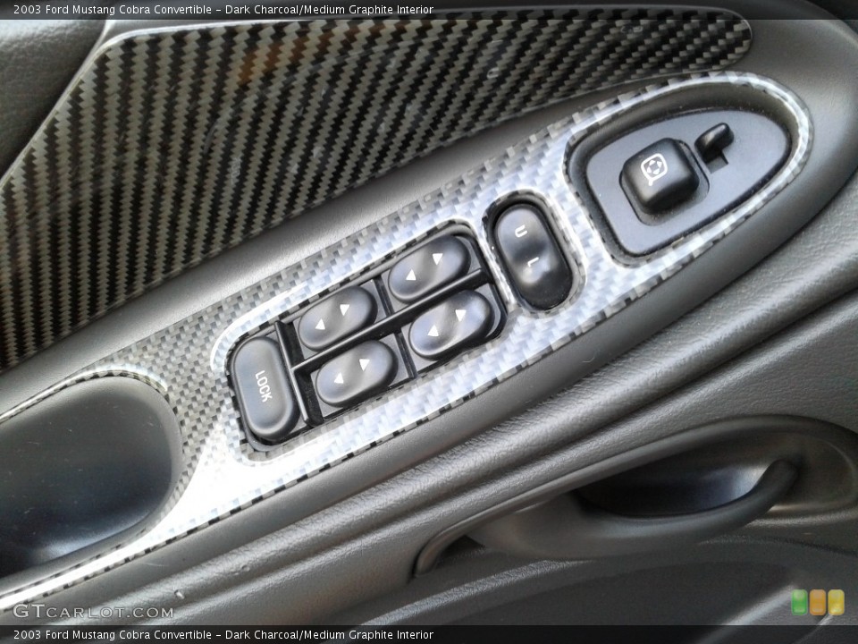 Dark Charcoal/Medium Graphite Interior Controls for the 2003 Ford Mustang Cobra Convertible #134779176