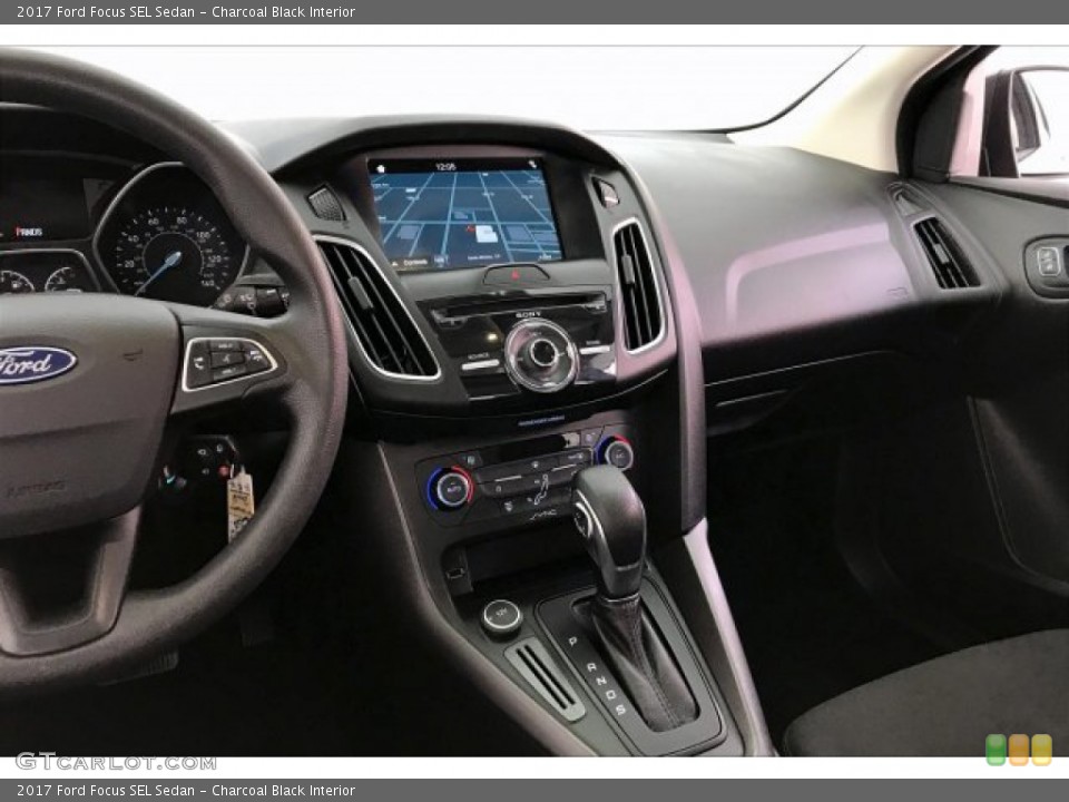Charcoal Black Interior Controls for the 2017 Ford Focus SEL Sedan #134953490