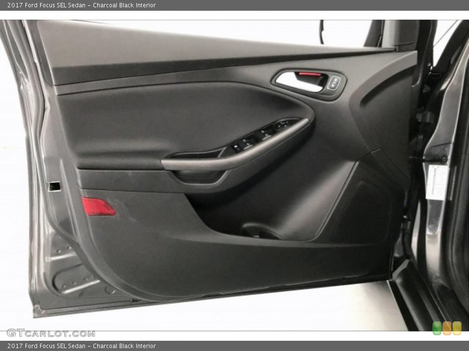 Charcoal Black Interior Door Panel for the 2017 Ford Focus SEL Sedan #134954048