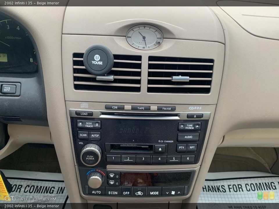 Beige Interior Controls for the 2002 Infiniti I 35 #135536004