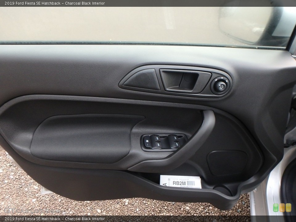 Charcoal Black Interior Door Panel for the 2019 Ford Fiesta SE Hatchback #135651174