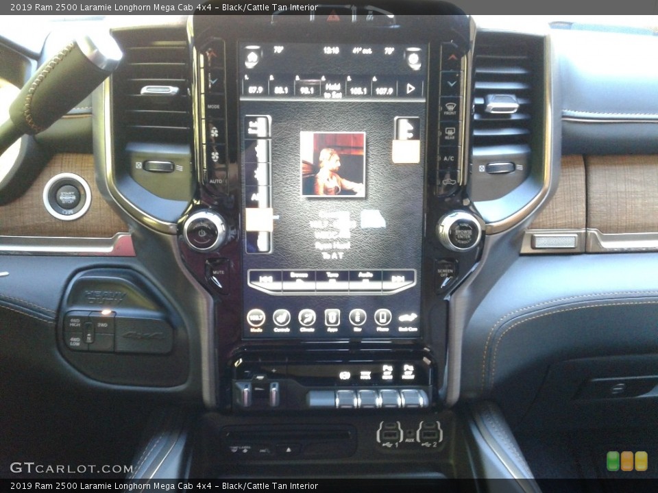 Black/Cattle Tan Interior Controls for the 2019 Ram 2500 Laramie Longhorn Mega Cab 4x4 #136017580