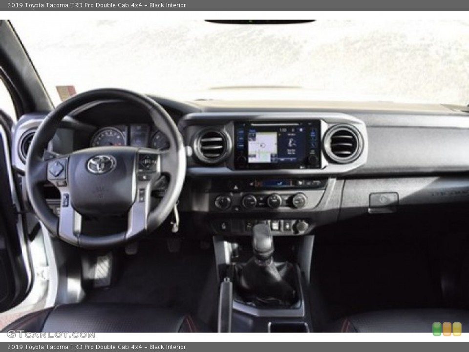 Black Interior Dashboard for the 2019 Toyota Tacoma TRD Pro Double Cab 4x4 #136414240