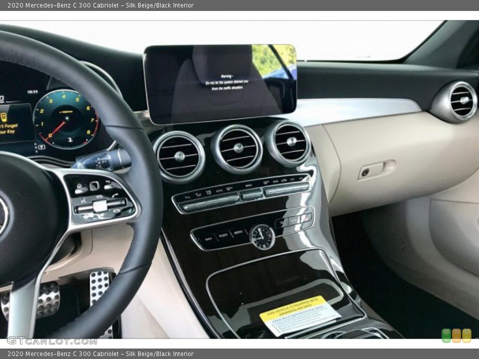Silk Beige/Black Interior Controls for the 2020 Mercedes-Benz C 300 Cabriolet #136439274