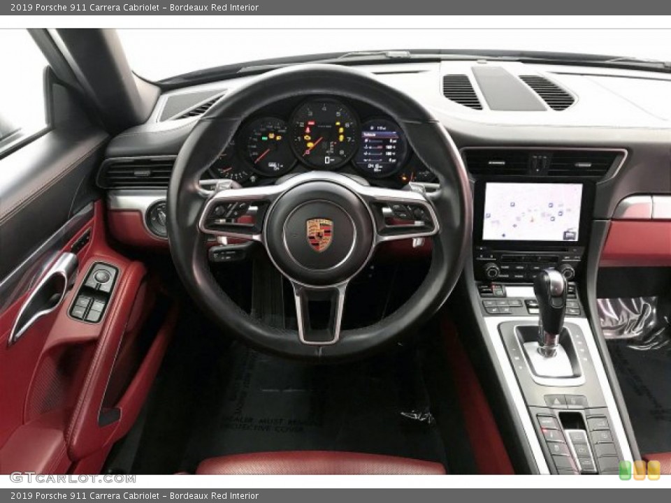 Bordeaux Red Interior Dashboard for the 2019 Porsche 911 Carrera Cabriolet #136834558