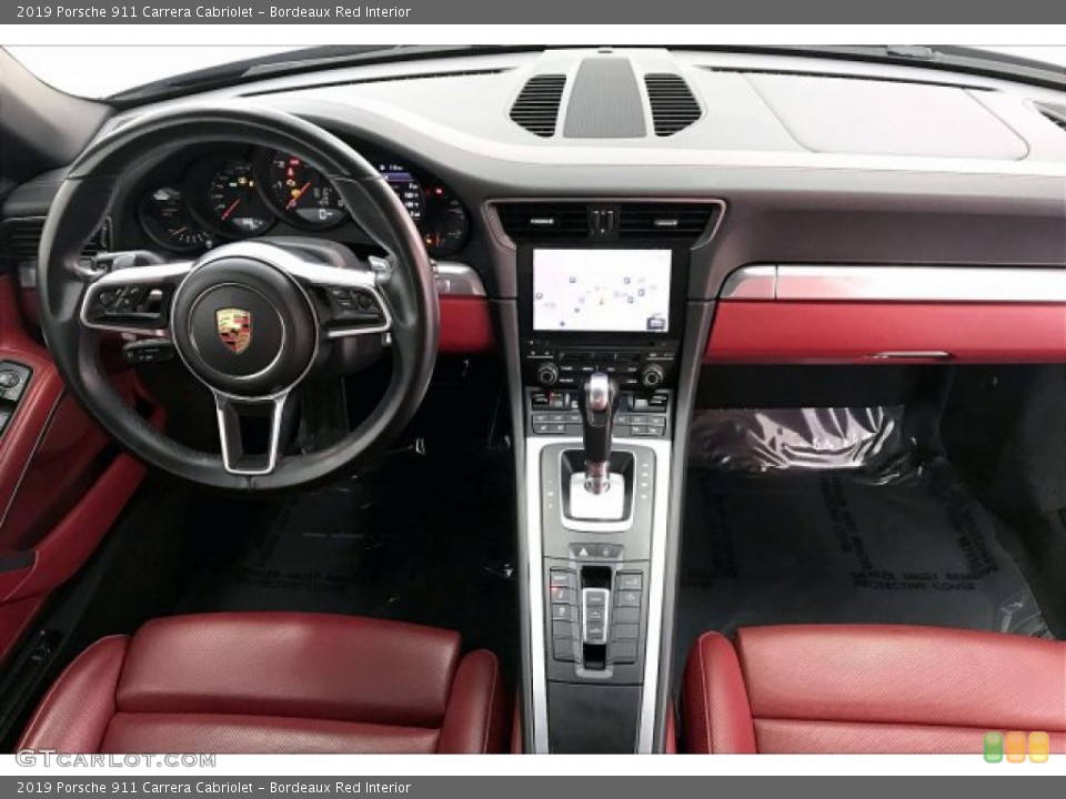 Bordeaux Red Interior Dashboard for the 2019 Porsche 911 Carrera Cabriolet #136834849