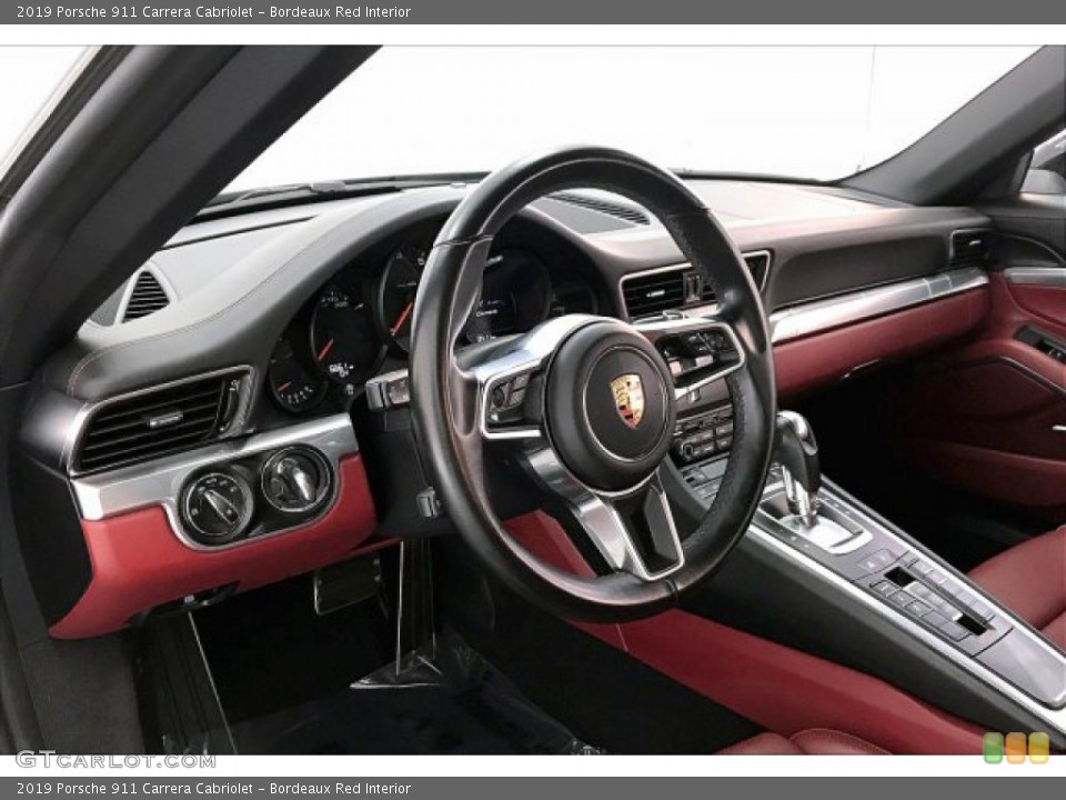 Bordeaux Red Interior Steering Wheel for the 2019 Porsche 911 Carrera Cabriolet #136834972
