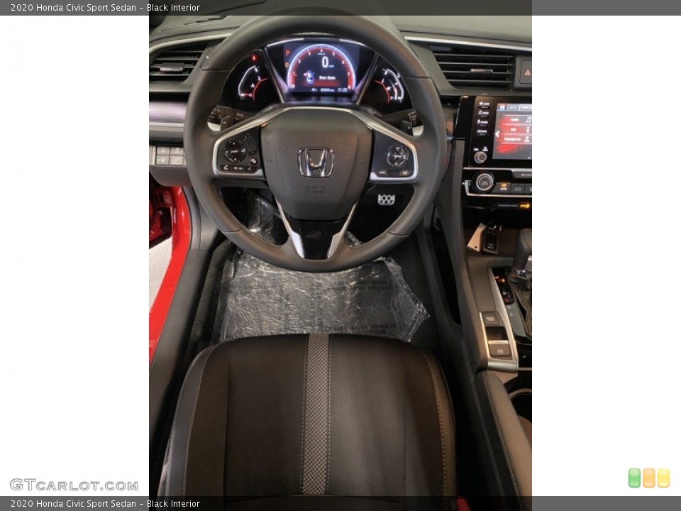 Black Interior Steering Wheel for the 2020 Honda Civic Sport Sedan #136987069