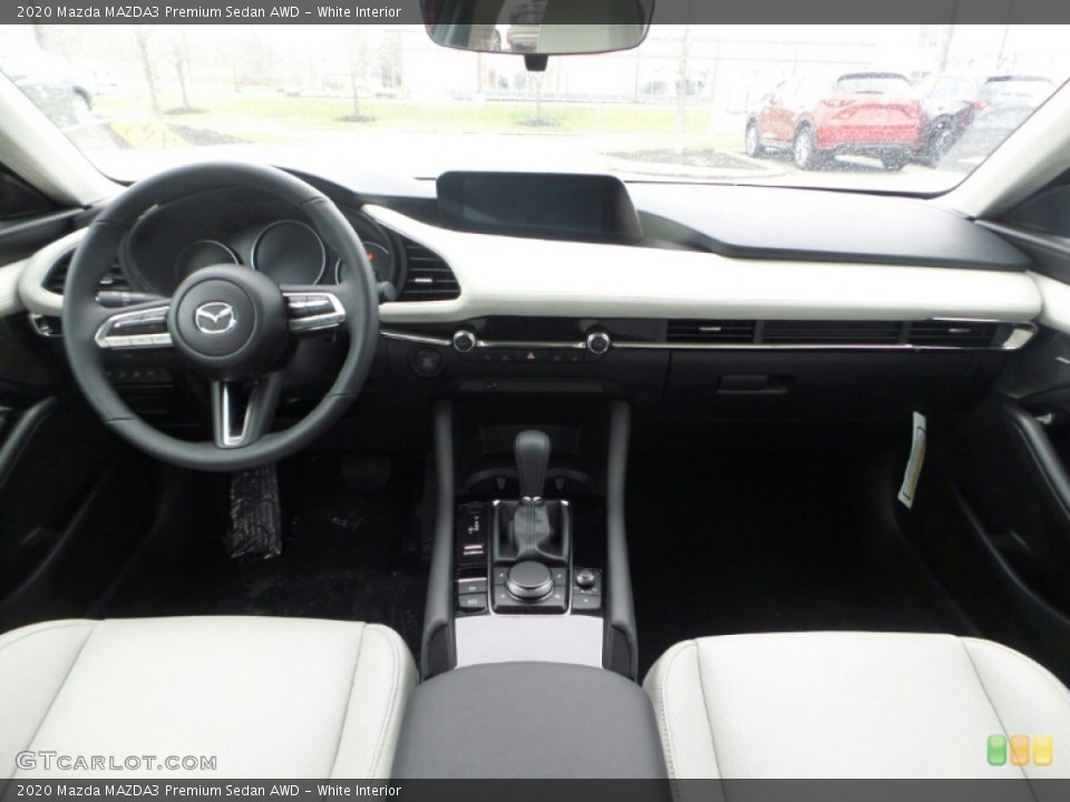 White Interior Dashboard for the 2020 Mazda MAZDA3 Premium Sedan AWD #136999504