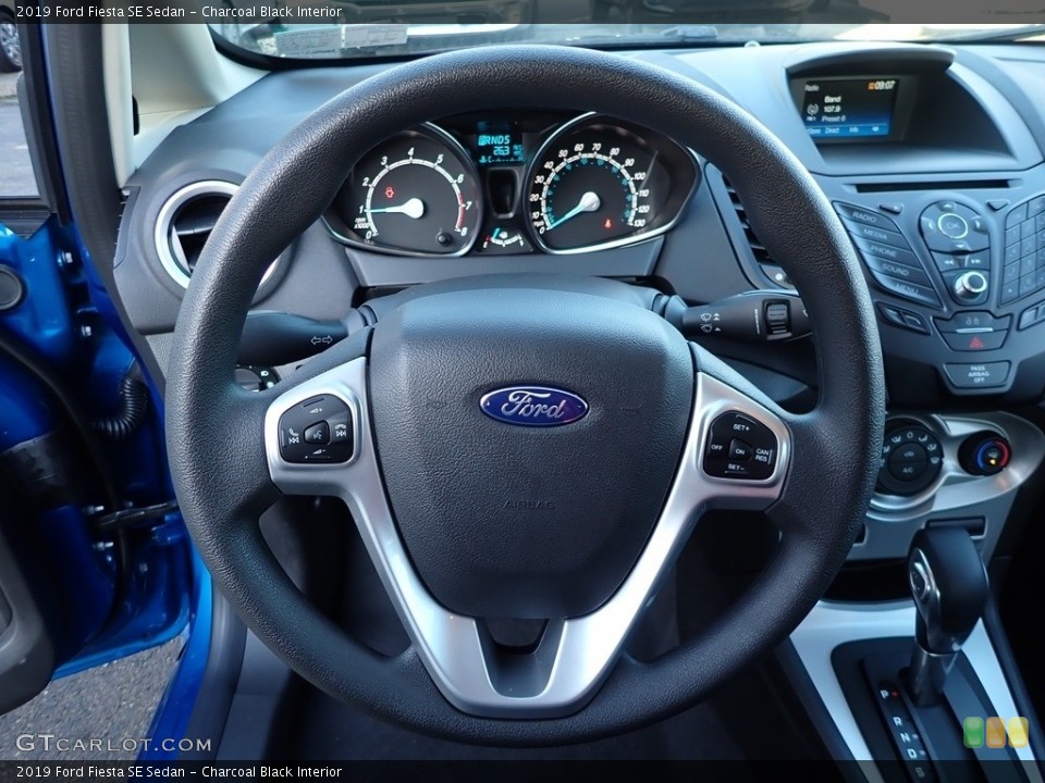Charcoal Black Interior Steering Wheel for the 2019 Ford Fiesta SE Sedan #137098256