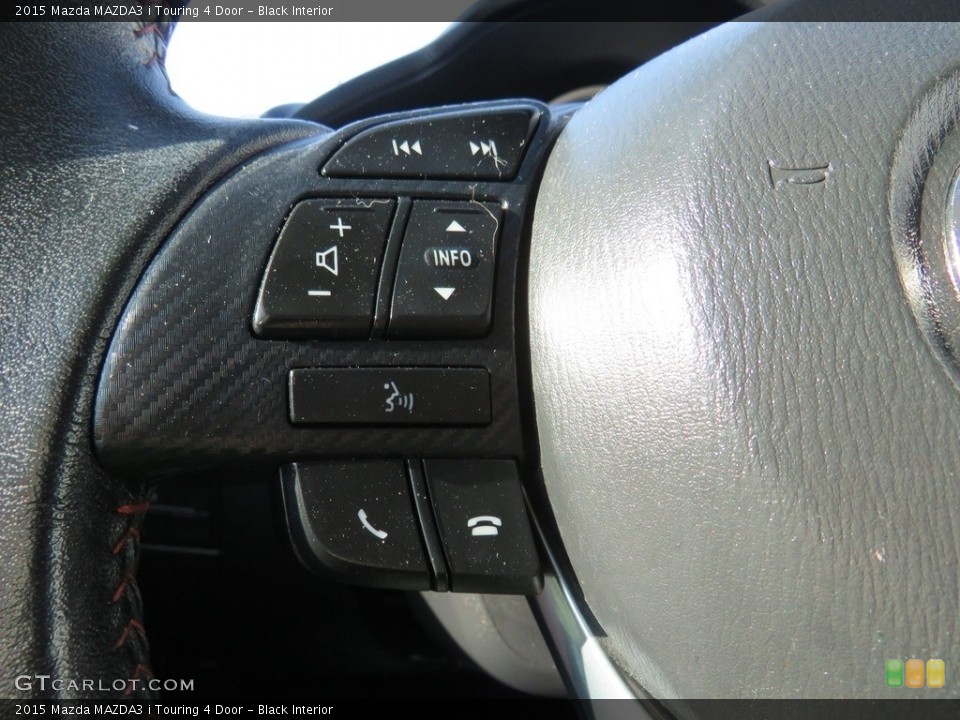 Black Interior Steering Wheel for the 2015 Mazda MAZDA3 i Touring 4 Door #138224759