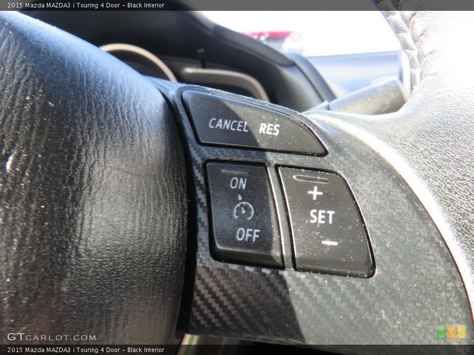 Black Interior Steering Wheel for the 2015 Mazda MAZDA3 i Touring 4 Door #138224789