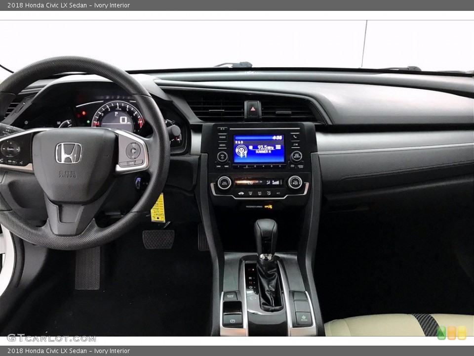 Ivory Interior Dashboard for the 2018 Honda Civic LX Sedan #138399310