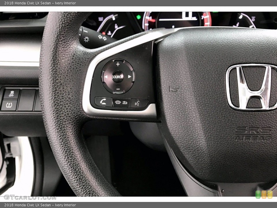 Ivory Interior Controls for the 2018 Honda Civic LX Sedan #138399336