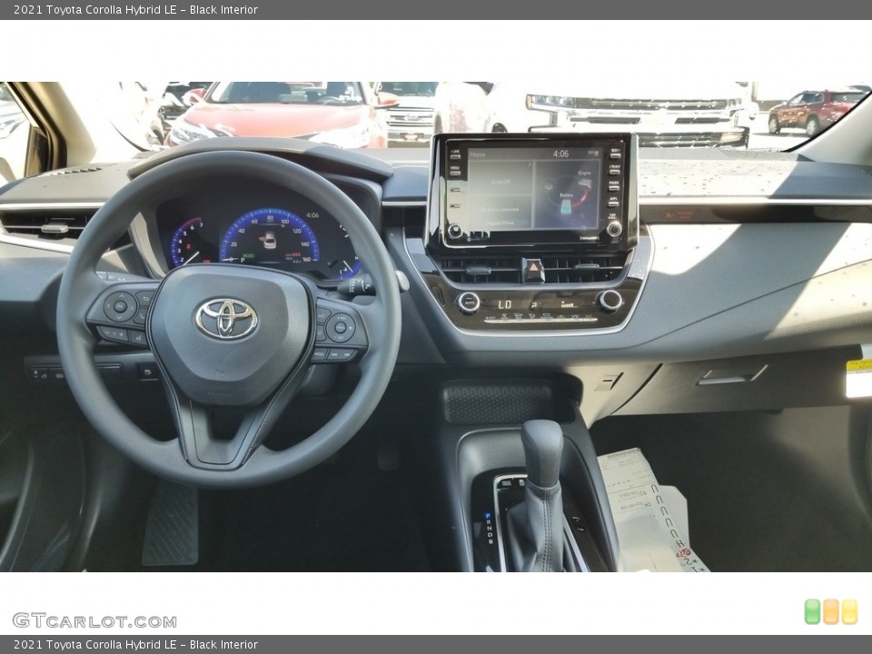 Black Interior Dashboard for the 2021 Toyota Corolla Hybrid LE #138407016