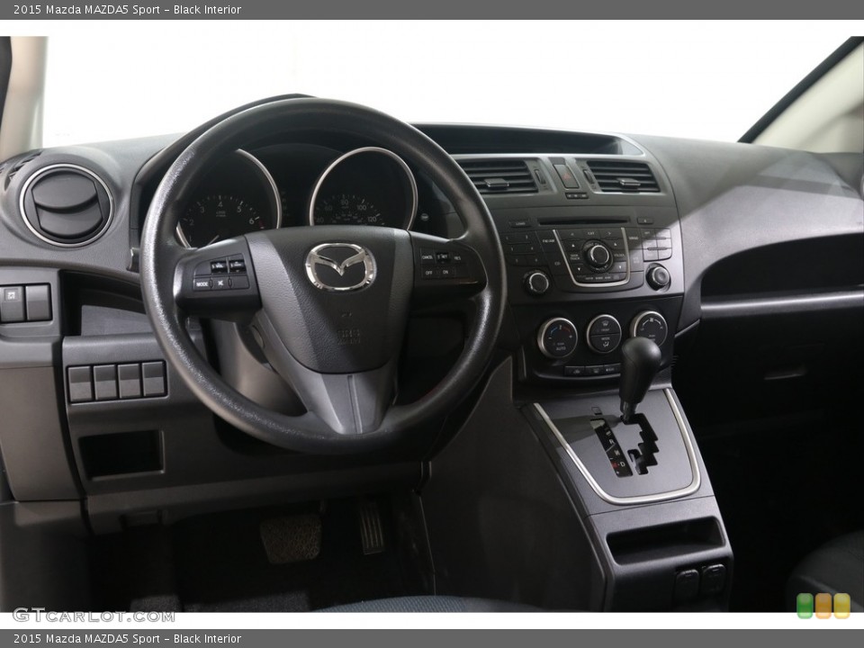 Black Interior Dashboard for the 2015 Mazda MAZDA5 Sport #138475907