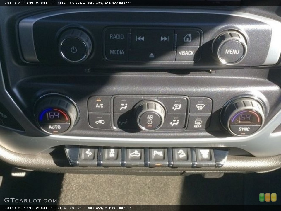 Dark Ash/Jet Black Interior Controls for the 2018 GMC Sierra 3500HD SLT Crew Cab 4x4 #138518595