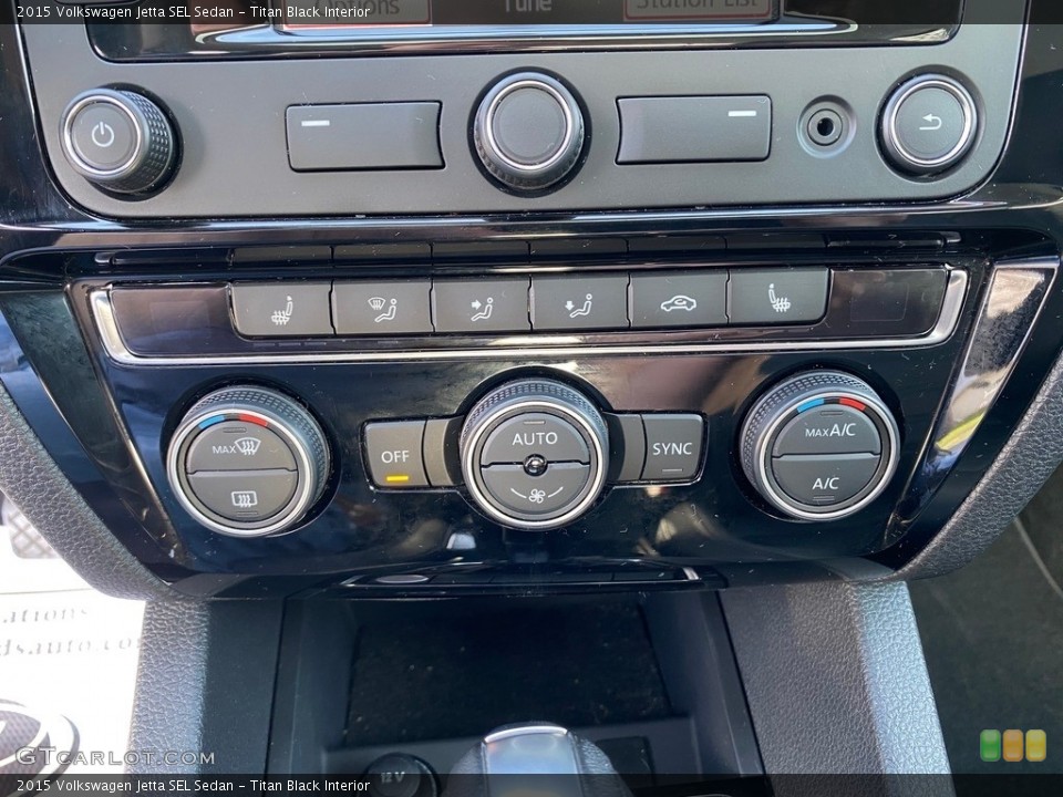 Titan Black Interior Controls for the 2015 Volkswagen Jetta SEL Sedan #138555216