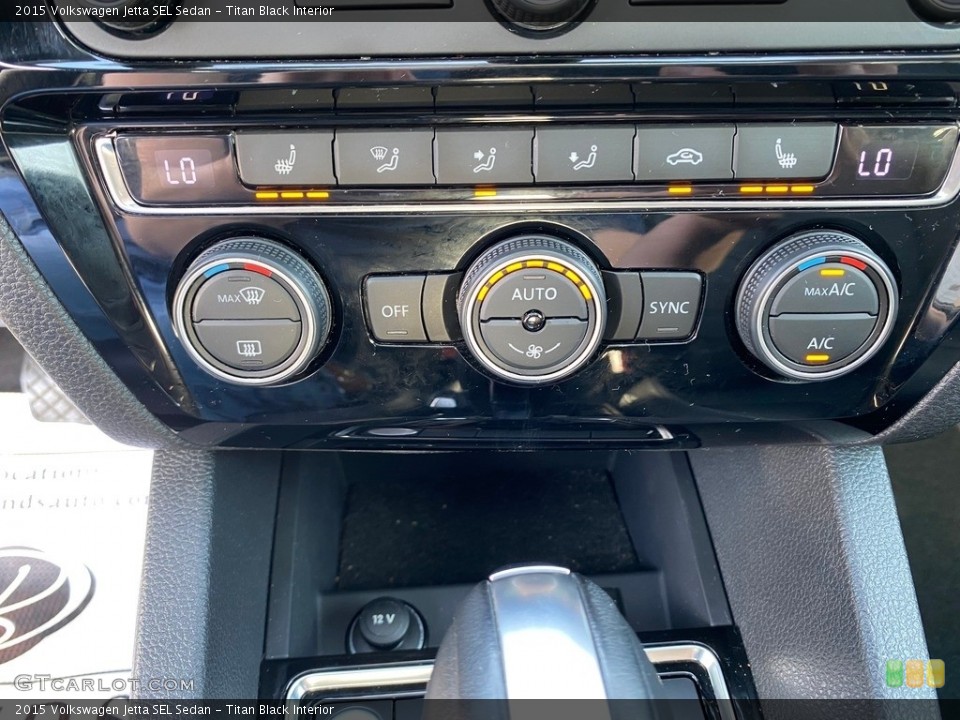 Titan Black Interior Controls for the 2015 Volkswagen Jetta SEL Sedan #138555243