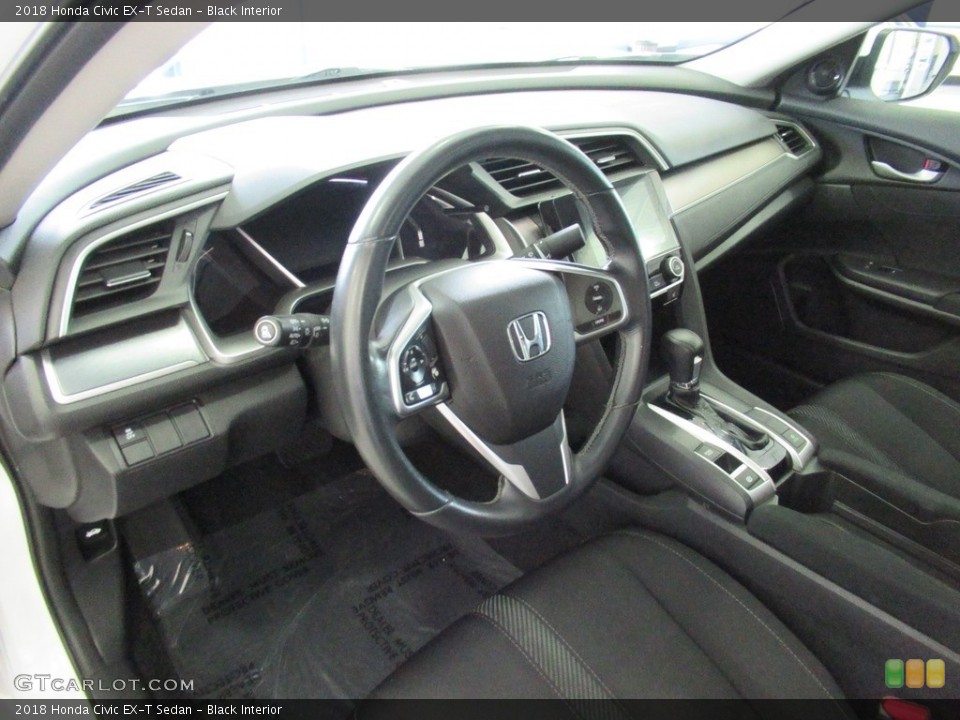 Black Interior Dashboard for the 2018 Honda Civic EX-T Sedan #138597138
