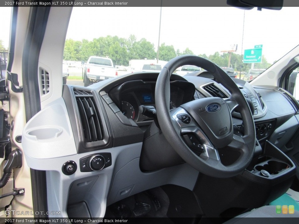 Charcoal Black Interior Steering Wheel for the 2017 Ford Transit Wagon XLT 350 LR Long #138619137