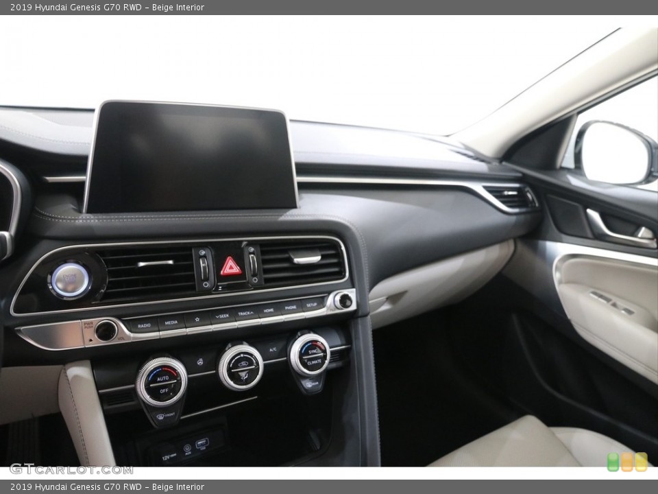 Beige Interior Dashboard for the 2019 Hyundai Genesis G70 RWD #138619716