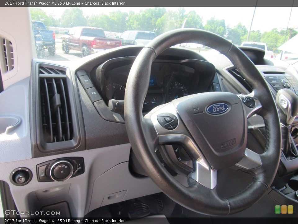 Charcoal Black Interior Steering Wheel for the 2017 Ford Transit Wagon XL 350 LR Long #138629361
