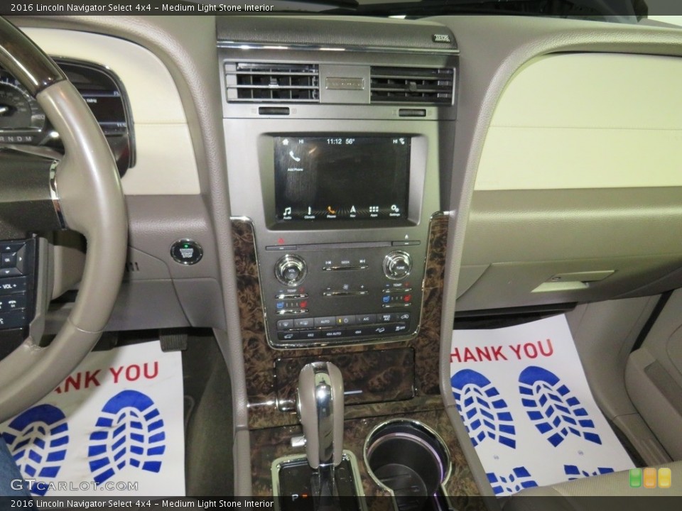 Medium Light Stone Interior Controls for the 2016 Lincoln Navigator Select 4x4 #138739445