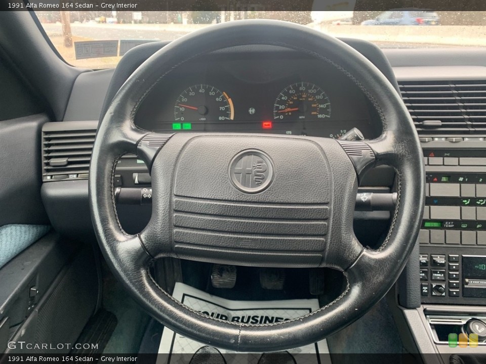 Grey Interior Steering Wheel for the 1991 Alfa Romeo 164 Sedan #138763344