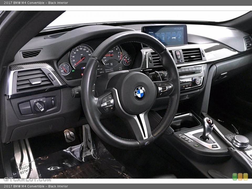 Black Interior Dashboard for the 2017 BMW M4 Convertible #138839750