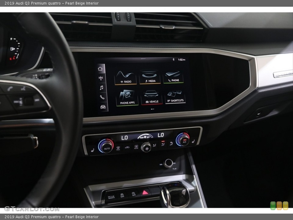 Pearl Beige Interior Controls for the 2019 Audi Q3 Premium quattro #138875105
