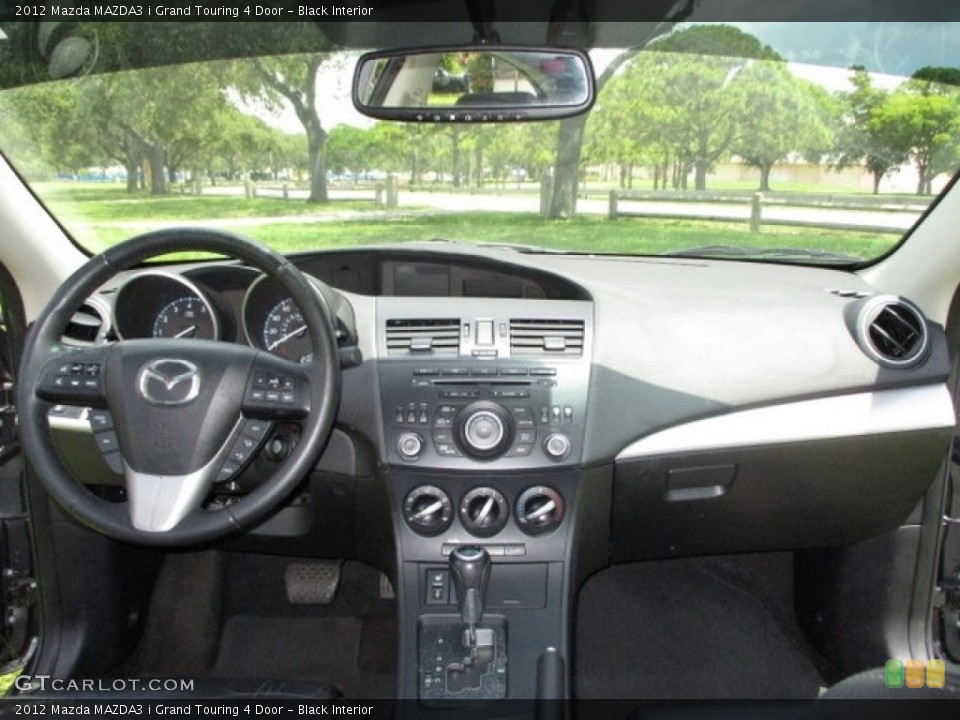 Black Interior Dashboard for the 2012 Mazda MAZDA3 i Grand Touring 4 Door #138941309
